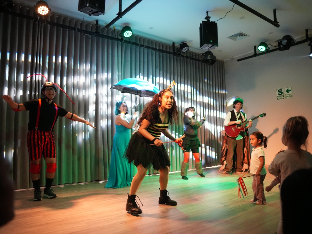 Iridiscente en escena